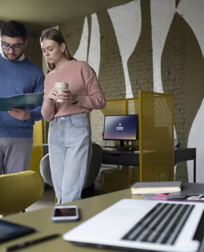 colleagues-reading-together-medium-shot